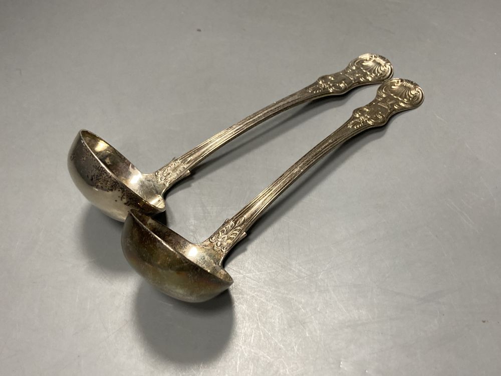 A pair of William IV Scottish silver Queens pattern sauce ladles, John Muir, Glasgow, 1833, 17.2cm, 3oz.